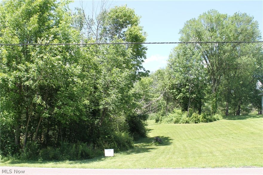 Just over 8.5 wooded acres of buildable property including accessibility to all utilities (city water, county sewer, natural gas, cable, phone, and electric). Beautiful buildable front half with great views of scenic wetlands.