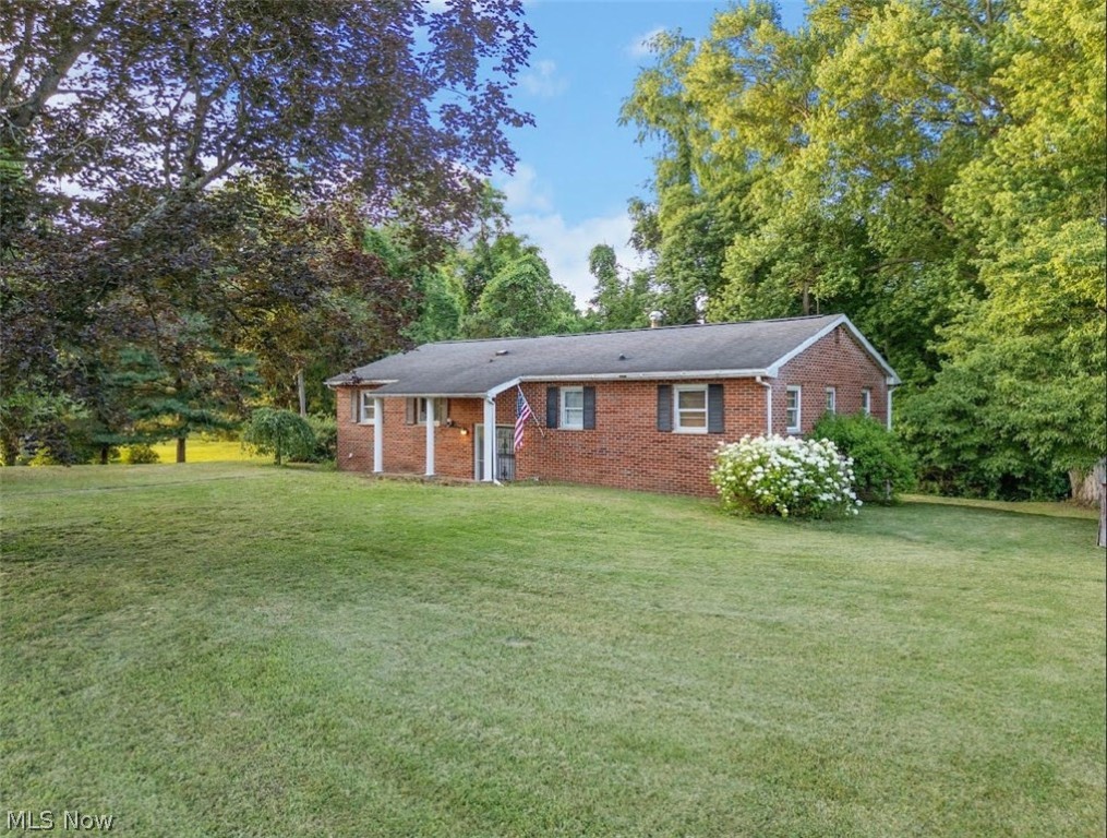 Beautiful brick bilevel home featuring three spacious bedrooms and one and a half baths on the main floor. Enjoy the elegance of wood floors throughout. Relax on the newly constructed deck with serene wooded views. This property boasts a huge yard, perfect for outdoor activities and entertaining. Located in the desirable Williamstown school district. Don't miss the opportunity to make this charming home yours!