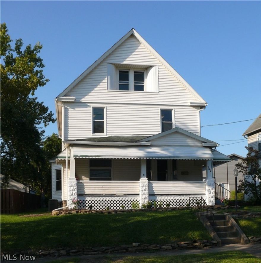 Everything You Ever Wanted in this Absolutely Beautifully Totally Restored CENTURY HOME!  Large Living Room with Fireplace.  Upscale Large Kitchen with Corian Countertops--60 Inch Island with Seating plus Appliances!  Formal Dining Room with Bay Window!   Convenient Laundry Room with Washer & Dryer Off Kitchen!  All New Flooring with Refinished Hardwood, Luxury Vinyl and Carpeting!  4 Bedrooms, Half Bath 1st Floor, Full Bath 2nd Floor.  Walk-up Attic.  Full Basement!  Welcoming Front Porch!   2-Car Garage.