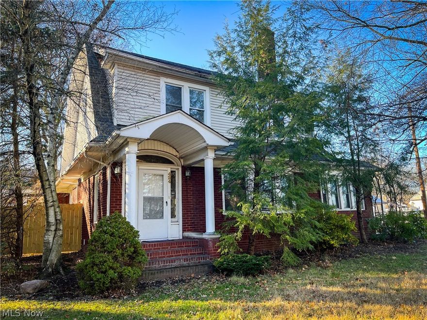 424 S Portage Path --- a 4 bedroom, 1.5 bath colonial boosting nearly 2,700 sqft on .36 acres. Just minutes from Highland Square! Grand foyer with stairway. Lots of space + windows in the living room with wood-burning fireplace right next to the sunroom! Ample cabinet space in the kitchen -- appliances remain. Grand dining area ideal for hosting. Half bath located on the first floor. Wood floors and original woodwork throughout. Two separate staircases leading to the second floor, one located off of the hallway by the kitchen & the other by the foyer. Spacious bedrooms with walk-in closets. 3 bedrooms are located on the second floor with one bedroom/bonus room on the third floor, finished attic area. Tiled full bathroom is located on the second floor. Plenty of built-in's and storage everywhere! There's also an enclosed porch with landscapes + a wall heater. 2 car attached garage. New Privacy fence in yard (Oct '22) with rear deck. Waterproofed basement ($25k) with a transferable warra