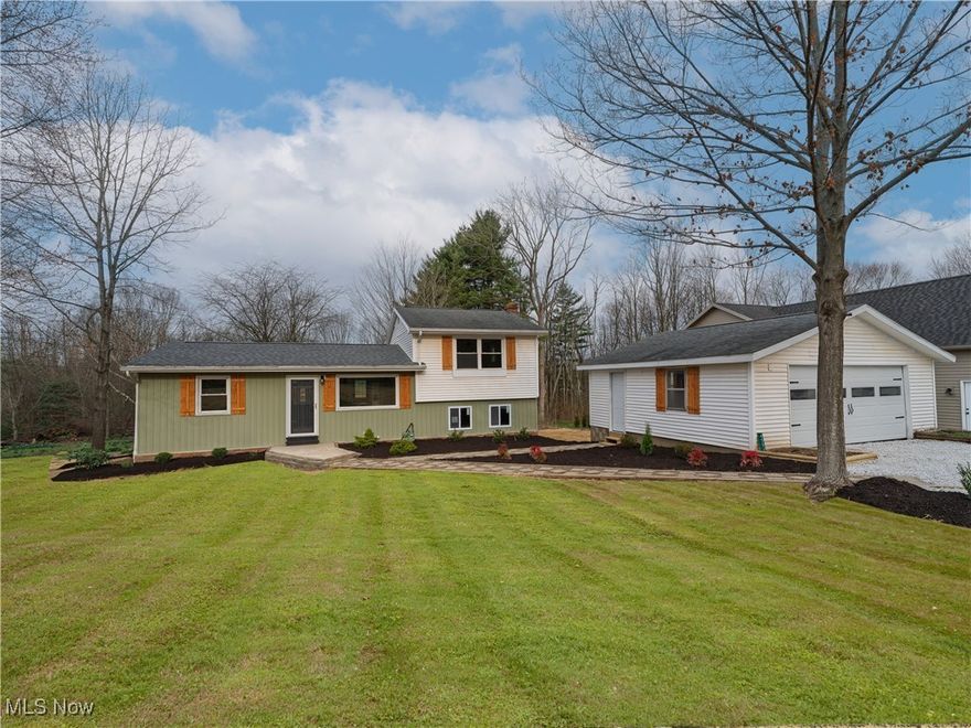 Wow! Check out this stunning split-level located in the Perry LSD. Boasting 3 bedrooms, 2 full baths and a huge 2.23 acre lot this beauty is sure to please! Make your way inside and you come to the open concept living room complete with luxury vinyl plank flooring and a perfect flow into your breathtaking kitchen. Offering all new cabinets, granite countertops, tile backsplash, stainless steel appliances and a peninsula for additional seating this is a must see. This gem features two first floor bedrooms and a main bathroom that offers a tub, tile surround, new vanity and toilet. Make your way to the upper level and you come to the massive owner's suite complete with a walk in closet and a full bath on-suite that will leave you speechless. If that isn't enough, down in the lower level is another living space which would be perfect for a man cave or flex space. Continuing down into the partially finished basement you have even more storage and/or living space complete with a walkout. This home is one of a kind! Do not wait! Call for your showing today!