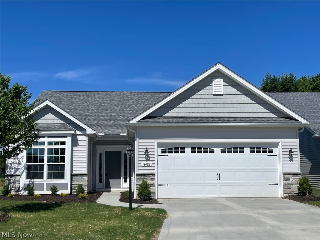 Don't miss this Ranch Slab Cluster Home in Strongsville! Lots of upgrades including an additional 76 sq feet for a 1850 total sq ft home and a beautiful covered concrete patio! This open concept floor plan features 3 bedrooms (all with walk-in closets) and 2 full baths. Modern ugraded LVP/LVT flooring everywhere, carpet in all bedrooms. The 4th room that could be an office, exercise room, sewing room, pantry etc. Larger Quartz kitchen cabinet layout with painted white cabinets, including one roll-out. Electric range with a vented microwave, gas hook-up option. Master bedroom has tray ceiling. Upgraded Master Bath Quartz countertop with double undermount sinks. Additional shelving in closets. Upgraded Main Bath Granite countertop with undermount sink. Kensington Homes, presents Poured wall foundations, 95% HE Trane gas furnace w/programmable thermostat and many other energy saving features, 200 amp electrical and 50 gal hot water tank! "The Reserve" is the Cluster Home section of