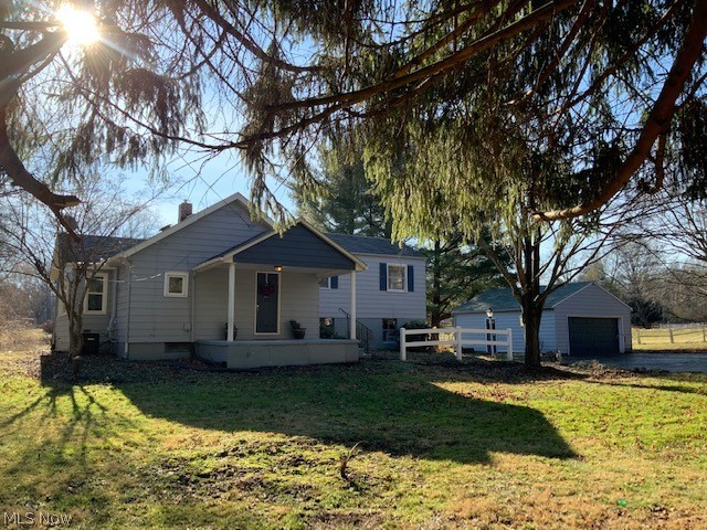 Cute little Bungalow with 3-bedrooms. Large living room with new carpet, freshly painted kitchen with breakfast bar, dining room with large picture window, bedroom and full bath on first floor. Up several steps are two more freshly painted bedrooms. Large front porch, detached, oversized 2-car garage, shed, and creek on almost an acre on dead-end street. New carpet, freshly painted inside and outside. Newer furnace and C/A. Enjoy country living while minutes from the heart of the city.
