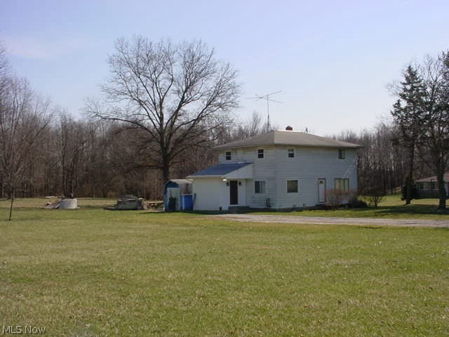 4 bed, 2 bath home on 2.5 acres ready to rehab! Hardwood floor throughout! Upstairs bath gutted, 4th bed could be walk in closet. Kitchen and 1/2 bath need remodeled. Shower added in basement laundry. Basement wood/coal burner option to heat house. Most windows replaced! Roof approx 15 years, except entry roof 4 yrs. Well pump 2007 and septic 2000. Gorgeous 2.5 acres, side yard includes the smaller pine trees and continues into the woods approx 75'. Storage shed and rear lean to. Great country living in area of newer homes!