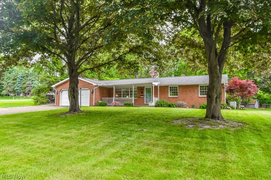 3 bedroom all brick ranch on a beautiful 1/2 acre lot!  This well maintained home offers a front living room with large windows that look out to the covered front porch as well as a family room with a ventless gas fireplace. The fully applianced kitchen includes space for casual dining with room for more formal meals in the adjoined dining room. Down the hall, there's a primary bedroom with a private half bath plus 2 more bedrooms with double closets and a full bath with a convenient laundry chute. Lots of storage space in the full basement which also has a workshop and laundry area.  A 4 season sunroom off the back of the house opens to a brick patio and gorgeous backyard with mature trees and a Shaker style shed with electricity! Additional outdoor features include meticulous landscaping surrounding the home, and a 2 car attached garage with space off the drive for extra parking. This is a great find in the Perry Local school district.  Schedule your showing today!