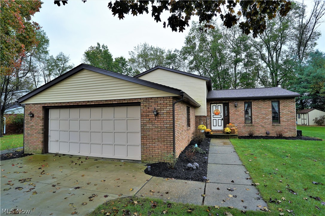 Welcome home to this wonderful 4 bedroom split level in Plain LSD! Wood plank flooring throughout the main level which includes one of two spacious living areas and eat-in kitchen with newer stainless steel appliances that leads out to the large cement patio. This home is situated on almost half an acre with a wood line and field behind it. The best of both worlds when it comes to an allotment feel and privacy! A full bathroom and three newly carpeted bedrooms upstairs, which includes double closets in the master. A second spacious living room is downstairs with a brick, wood burning fireplace, making this space so cozy! The second full bathroom has been beautifully updated with tile flooring, a tile shower and new modern vanity. A 4th bedroom with plank flooring leads to the 2 car garage and is currently used as a great office space! Continue down the stairs to the basement for laundry and plenty of area for storage! New roof 2018 and the sellers are offering a home warranty!