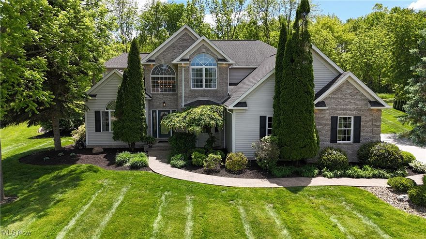 Amazing opportunity to own a luxury home filled w/ style, space, and comfort in the desirable Portage Commons neighborhood! Nestled on nearly an acre, this 4-bdrm, 3-bth home is a rare find offering refined interior features, expansive living space, and an entertainer’s paradise outdoors. Step through the grand foyer and immediately feel the warmth and elegance this home exudes. The main floor features a private home office with French doors and a tray ceiling, perfect for remote work or quiet study. A formal dining room sets the stage for special gatherings, while the gourmet kitchen impresses with granite counters, stainless steel appliances, a center island, and ample cabinetry—ideal for both everyday living and entertaining. Flowing from the kitchen is a spacious living room with a cozy gas fireplace, making it the perfect place to unwind. A half bath and first-floor laundry add convenience, and fresh paint gives the entire home a bright, modern feel. Upstairs, retreat to the expansive master suite complete with a walk-in closet and a spa-like bathroom w/ double sinks, a soaking tub, and a separate standing shower. Three additional generously sized bdrms and a full bath w/ double sink complete the second level. The full basement offers incredible potential—whether you need abundant storage or want to create a custom rec room, workout space, or theater, the possibilities are endless. 
Finally- Step outside to your own backyard oasis! Enjoy the summer days in the heated above-ground pool w/ a stylish wrap-around bar, outdoor kitchen space w/ natural gas hookups & and retractable awning- or sit back and relax on the large deck. A firepit and mature trees offer privacy and year-round charm. Additional highlights include- attached 3-car garage, large driveway w/ built-in basketball hoop. Newer roof, HVAC, tankless HWT & more. Don’t miss your opportunity to own an exceptional home in one of the area’s most sought-after neighborhoods. Schedule your private tour today!