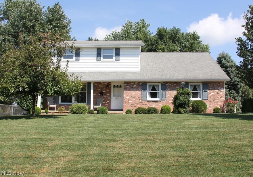 This home, located in a cozy neighborhood, is bursting with character! Large backyard complete with a large Trex Deck is ideal for pets, kids, or entertaining! The interior boasts a large bright living room, formal dining room, eat-in kitchen with new top of the line Frigidaire appliances and vinyl flooring in 2013! Another large living room is towards the back of the house with a brick fireplace and access to the deck. The foyer has wood flooring and a coat closet! There is also a convenient half bath on the first floor. Upstairs we have 4 spacious bedrooms and a full bath! All three bedrooms have beautiful hard wood flooring and blinds.  The full bathroom has dual sinks and tub/shower combo! This home has been extremely well maintained. Including, but not limited to,  a new water softener in 2013, new Genie garage door opener in 2013, new concrete pad in 2010, and the kitchen cabinets were refaced in 2003! This house is absolutely move-in ready! It is sure to make the new owner’s hap