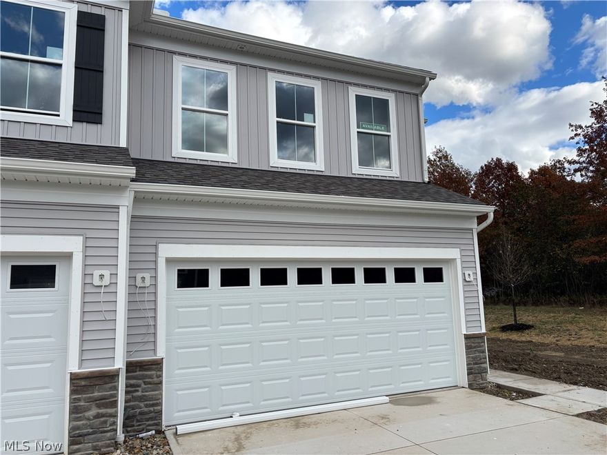 Experience luxury townhome living at Hope Pointe Place in Westlake. Only 3 minutes away from Crocker Park, enjoy an upscale metropolitan lifestyle with countless retail, dining, and recreational activities just a walk away. This new home construction community is located in the Westlake School District and is a mile from the Lake Erie shoreline. Our spacious Bowman floor plan at 1725 Merlot Ln offers the perfect blend of luxury, scenery, and functionality—with extra storage space! This end and corner unit features an open concept main level with an entertainer’s kitchen, gathering room with fireplace, café space, and sunroom extension leading to a perfectly landscaped patio with no one behind you and beautiful scenic backyard views. The second floor features a double walk-in-closet extension—a space large enough to use as a separate room! With 3 bedrooms, 2.5 baths, and an attached two-car garage, our Life Tested Bowman floor plan ensures you have the space you need to live your dreams.