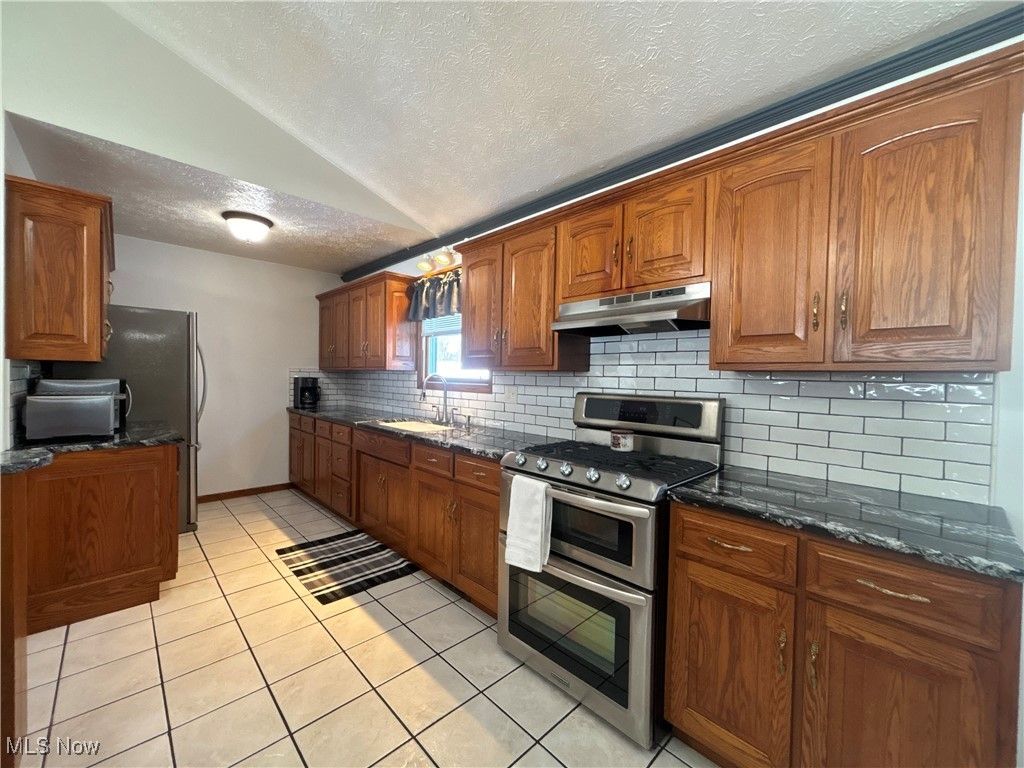 Photo of 10548 Briar Hill Drive, Kirtland, OH 44094 (MLS # 5184654)