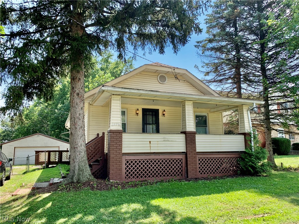 Charming home conveniently located in Stow and priced to sell! This home offers a living room, dining room, fully applianced kitchen, 3 bedrooms and a full bath all on one floor for easy ranch style living! Beautiful woodwork in the sunny living room and dining room. Replacement windows throughout. Front porch and side deck for you to enjoy, plus a large .26 acre fenced lot! Newer oversized 2 car garage and an additional storage shed. Bring your cosmetic touches and make this home your own!