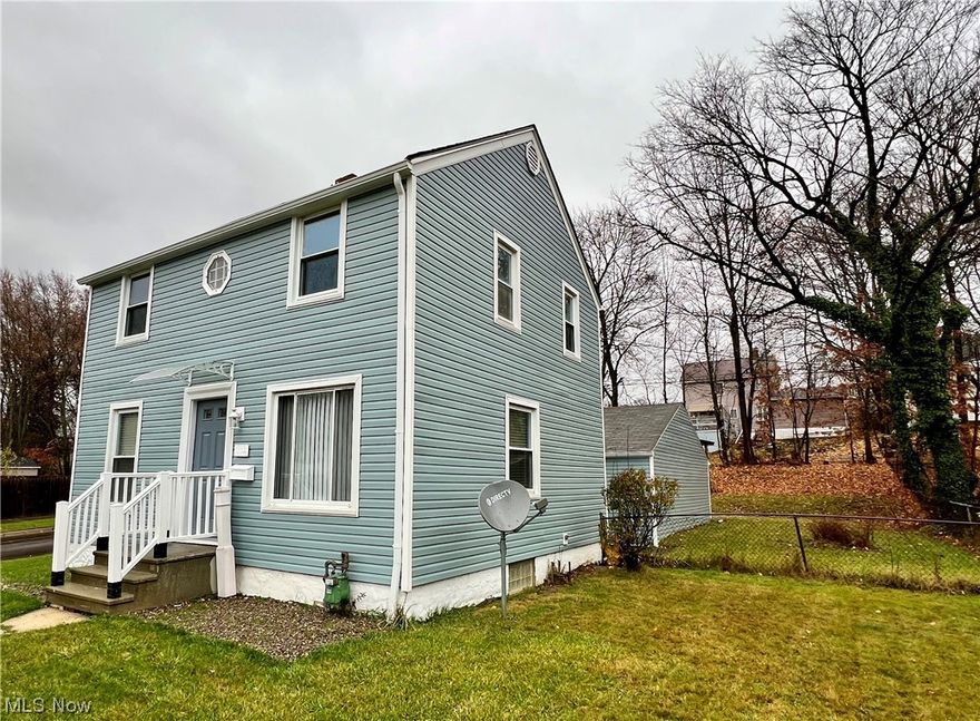 Welcome to 1113 Roslyn Ave.,Akron, Ohio.This property qualifies for up to $3500 in DOWN PAYMENT assistance.
This beautiful home has been remodeled to accommodate and compliment the growing family. The open floor plan adds to the overall comfort of the entire first floor. Updated lighting throughout the home, creates a feeling of warmth and coziness. The wooden ceiling in the kitchen blends in perfectly with the hardwood floors in the Living Room and Dining Room. An updated foyer, adds additional square footage to entertain large family gatherings. Upstairs has a newly remodeled bathroom and three very cozy carpeted bedrooms. The exterior has new siding, a new roof and new windows. A two car garage completes the overall appeal of this beautiful property! Welcome home!!!!  Please call agent for a private showing.