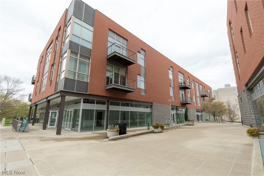 Prized one-bedroom condominium unit in the award winning and New York Times featured East College Street Project. Located in the heart of Oberlin, Ohio, this beautiful and modern condo has fresh paint and new, engineered wood floors throughout, high ceilings and great natural light. An open kitchen features granite countertops and newer appliances. The bedroom is spacious and bright and the oversized bathroom has granite counters and new floors. The unit includes a generous laundry room and an energy efficient tankless hot-water heater.  One outdoor parking space, additional indoor parking for a fee. Come join this very special community that is centrally located in downtown Oberlin. Step out the door for coffee at the Slow Train Café, or take in a concert at the Oberlin Conservatory of Music. Visit their world-class art museum, catch a movie at the historic Apollo theatre, and have a meal at one of many restaurants in this thriving and sophisticated college town.