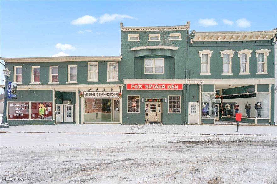 Amazing investment opportunity in the heart of Lisbon, Ohio: the oldest county seat in Columbiana County and a town rich with history, character, and small-town charm. 
This fully occupied mixed-use property delivers eight income-producing units in one powerful package: four street-level commercial storefronts with four residential apartments above, each with its own basement, adding valuable storage and utility space for both tenants and owners alike. Each business has its own identity and lease in place, creating immediate, diversified cash flow from day one. What makes this opportunity even more exciting? One of the storefronts: Dashing Diva’s Boutique, is included in the sale as a turnkey retail business, complete with its established brand and presence. The remaining three storefronts are independently owned and operated with current lease agreements already in place.  Above the shops, you’ll find four residential units: One 2-bedroom apartment, One 1-bedroom apartment, One additional 2-bedroom apartment, One spacious 3-bedroom apartment.
All eight units are currently rented, providing immediate income and built-in stability the moment you take ownership. 
Whether you’re expanding your portfolio, stepping into commercial investing, or seeking a property that blends community, commerce, and consistent returns this building delivers. It’s not just a property… it’s a thriving mini-economy in one of Lisbon’s most charming locations.