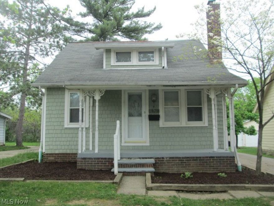 Cozy 2 bedroom Cape Cod. Welcoming front porch! Tons of hardwood throughout! Spacious living room with gas fireplace. Nice kitchen with eat-in area. Full basement. Immaculate and neutrally decorated. 1 car detached garage. Move right in!