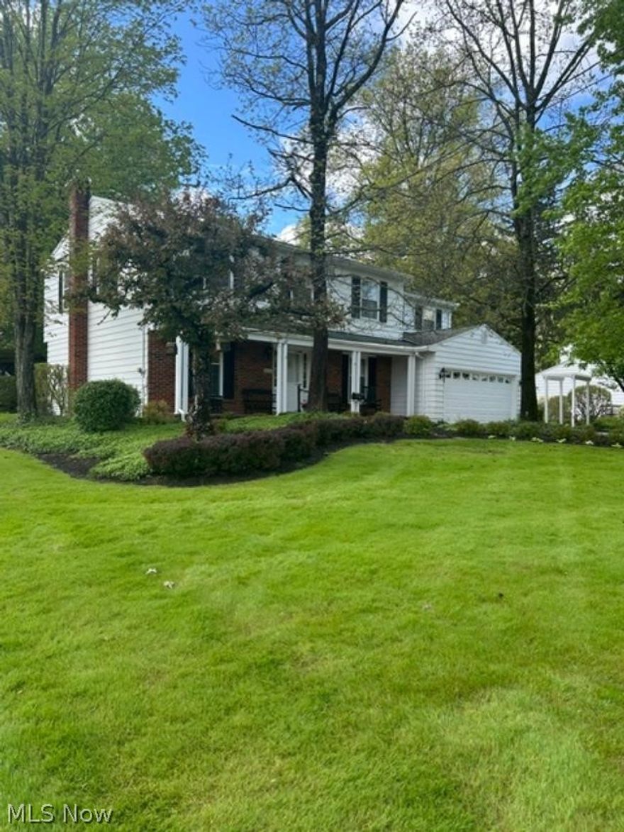 Situated in the beautiful Chapel Hill Estates on a lovely wooded lot. Step out onto the Metroparks walking and bike path from the private manicured back yard.  This immaculate 5 bedroom home is move-in ready with all newer high end appliances.  The addition to the home created a modern open concept kitchen to include custom cabinetry and lighting with adjacent great room and gas fireplace overlooking the luscious wooded property and Metropark. Hardwood floors throughout the entire home with a first floor living room, formal dining room, family room and guest bathroom. The private deck leads to the amazing summer house – a perfect place to relax or entertain surrounded by lush landscaping and nature--a must see! The second floor features 5 spacious carpeted bedrooms with wood flooring beneath. A full solid basement with workshop is just one more feature with plenty of room for play, work or hobbies.  Adjacent spacious shed with electric.  Excellent Brecksville schools.
This central location offers quick access to Valor Acres, Rec Center with water park, library, Heinens, Starbucks, Metroparks, and restaurants.  Quick access to route 77 and Ohio Turnpike.