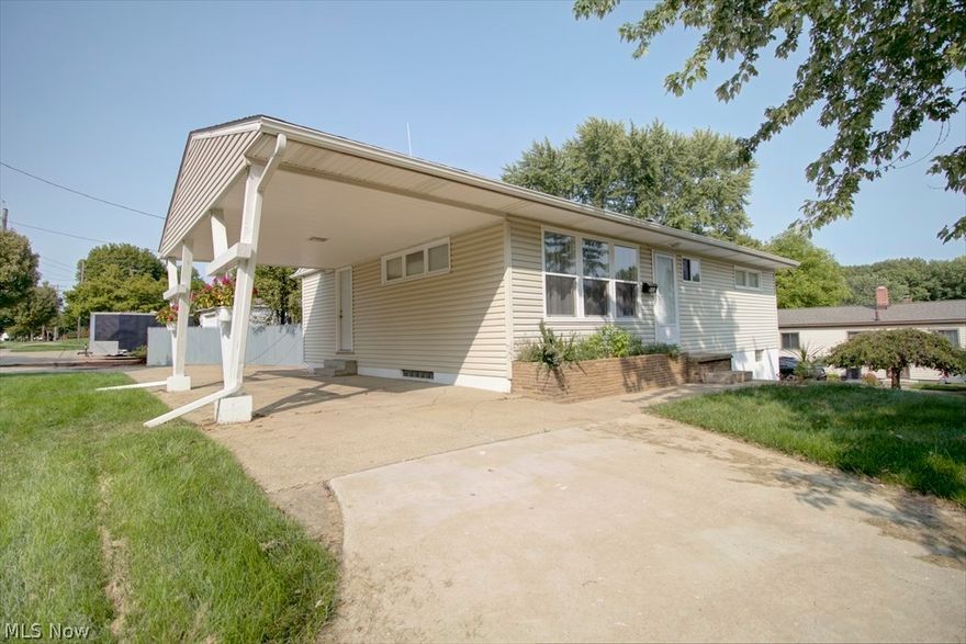 Beautiful raised California Ranch home on over a quarter acre awaits it's new owners! The sliders on the lower level walk out to a private backyard with a lovely patio, fire pit, new shed and a small brick building. The owners took special care to design a little oasis with the landscaping & a vegetable and herb garden. They also installed a wonderful paver patio with night lighting & a reinforced deck for a future hot tub! There are multiple entrances including a u-shaped carport that leads into the kitchen as well as a driveway on the opposite end where the attached garage leads to the lower level. The kitchen is updated including granite counter top island & stainless steel appliances, evening lights under/over cabinetry & the main bath is updated with ceramic tile flooring and shower. There is a cozy wood burning fireplace in the large 26x13 family room and plenty of closet space for storage throughout. The lower level also has a large laundry area. Other updates in 2018 are A/C. w