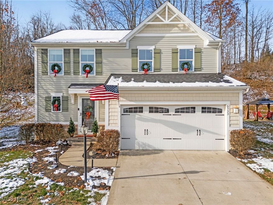 Wonderful two story home located in Lexington Farms: Welcome to 6533 Pine Bluff! Built in 2015, this home has a desirable floor plan. Open Kitchen area offers an eat-at island, all stainless steel appliances including a newer dishwasher, refrigerator, garbage disposal and walk-in pantry! Dining room overlooking the backyard and French doors leading to the large Trex deck which was installed in 2018. Nice sized Family Room leads down to the fully finished basement which was done in 2022. Over 600 additional square feet of finished area makes for a great Rec Room, Office, Workout Room and more! Water heater replaced in 2023. Upstairs you will find three bedrooms, a full bath with a tub/shower combination and a second floor laundry with built-in shelving! The Owner's Suite offers a huge walk-in closet and Owner's Bath with a tub/shower combination and smart mirror. Two car garage with water available! Minutes from Glenoak High School, restaurants and more! Just steps away from Stark Park walking path and parks offering endless opportunities for outdoor relaxation and entertainment!