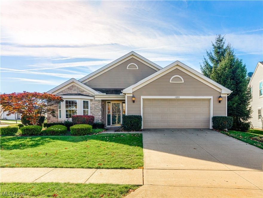 You'll love this Beautiful Open floor plan!  Massive Maple Kitchen with Bayed Windows, Island, quality built in Appliances, Big Pantry, Corian Solid surface counter tops, and a long Breakfast Bar (13')!  All this opens up to a Spacious Great Room with vaulted ceilings and oversize sliding doors to the large Patio.  Very private yard surrounded with Gorgeous mature Pines!  Such an amazing floor plan for Entertaining!  And best of all, for a low monthly fee you won't need to mow, shovel snow!  2nd BR has quality Built ins with a desk, and would also make a fantastic Office.  Attached 2 Car Garage.  1st Floor Laundry, 2 Full Baths, No steps!
New Furnace, A/C, and water tank in 2021.  Conveniently located with nearby access to 271, 480, or Rt 8.  A short drive to the CVNP, as well as many shops and restaurants.   A terrific house in a terrrific location!