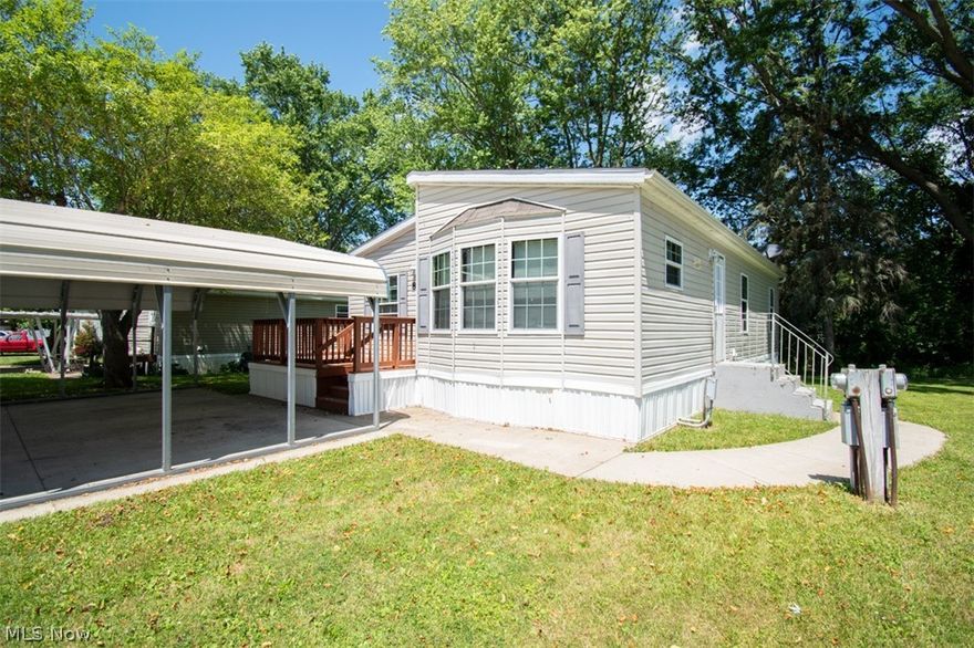 A beautiful Peaceful and Secure setting in West Branch School area  for this 2014  3 bedroom  2 full bath modular home with eat in kitchen , spacious living room with built in cabinet and  roomy laundry room with shelving creates a perfect place to call home . There is ample natural light with all the beautiful  windows. Sit on the front large  deck and enjoy the serenity of the parklike  area. Two car carport out front is convenient and protective . There is a great children's playground at the rear of the park.There is a shed and a  cement sidewalk leading to the exterior side entrance. Don't pay rent when you can own this great home .