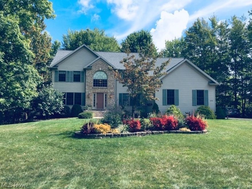 Welcome to your Dream Home! Beautiful and Inviting Updated Colonial w/3-Car Side Entry Garage - Located in Desirable Lake Plata! Neutral Décor and New Flooring throughout this 4 Bedroom Home with Formal Dining and Living Rooms. Relax in the 2-Story Family Room in front of the Brick Fireplace with New Luxury Plank Flooring (LVP) as well as in the Foyer, Living Rm and 1st floor Laundry Rm. Light filled rooms with circle top windows and Glass French Doors let the sun shine in!! Chefs Delight in the Updated Kitchen featuring Granite Counters, Tile Backsplash, New Fixtures, Island Breakfast Bar, Recessed Lights, Pantry, and Oak Cabinets Galore…Kitchen Appliances Stay too! Sliding Glass Doors w/Retractable Screen from Large Kitchen Dinette to Deck, Outdoor Lights, Wooded Lot and Sprinkler System. Very Private, Tranquil & Serene. Plenty of Room for Playtime and BBQs. 2nd Floor you will find the Master Suite with Raised Coffered Ceiling & Walk-In Closet. Glamour Bath include Dual Sinks, Quartz