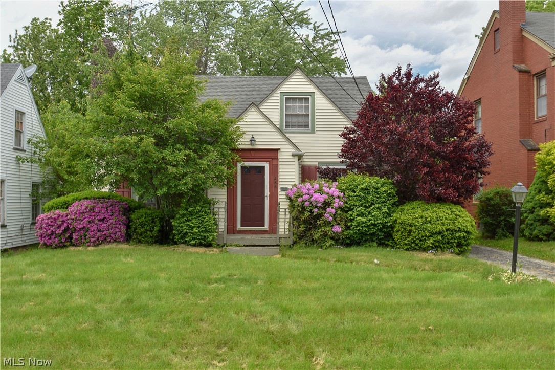 Enjoy sitting on the back patio having a cold glass of iced tea in this adorable cape cod home! It has beautiful hardwood floors throughout except in the eat in kitchen. The spacious living room is enhanced with a wood burning fireplace. You could enjoy entertaining in the formal dining room which has beautiful crown molding and a built in corner cabinet. Two nice size bedrooms and a full bathroom complete the first level. The enormous second floor can be one or two bedrooms--let your imagination run! Property is being sold "as is" condition.