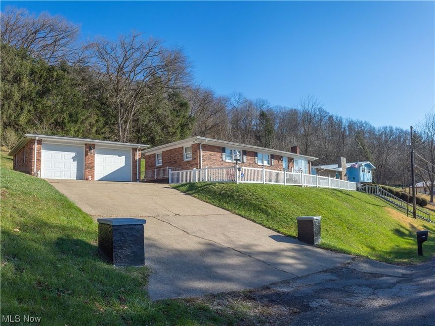 This updated 3 Bedroom / 2 Bathroom Ranch-style home is located at the end of Taney Avenue overlooking the Linwood Addition of Bellaire.  Do not overlook all the benefits this home has to offer.  Inside, you'll find a formal Living Room, Breakfast Room off the Kitchen and a formal Dining Room or possible home office.  The first floor Family Room is that extra space you have been looking for! Relax around the fireplace! Perfect for entertaining as the Family Room walks directly out to the covered patio. The outdoor patio has plenty of space for dining and is equipped with a custom built-in brick grill / prep area.  All 3 Bedrooms are located on the main level and all have hardwood floors.  The finished walkout basement features a large rec room, laundry / bathroom combo and two more bonus rooms.  The 2 car detached garage is perfect for keeping your vehicles out of the elements!  In addition, the 2-story outbuilding provides ample storage with enough space to park a car on the main level.  The possibilities are endless.  This listing includes 8 parcels in total adding up to just over an acre of land. The dead end street is private with very little traffic yet close to amenities.  Contact an agent to schedule a showing today !