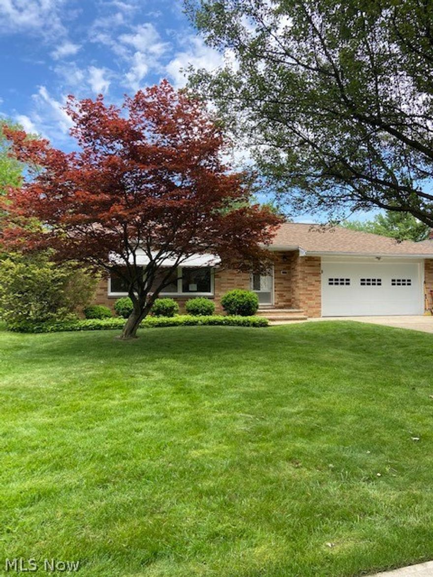 Beautiful brick ranch! With this open floor plan the kitchen over looks the dining room with bar seating at the peninsula, granite counter tops with white shaker cabinets. Refinished hardwood floors throughout, 2021 appliances, LED light fixtures, huge finished rec room with full bathroom, cedar closet , built in shelves and counter tops, new carpet 2021 also features a work shop that can also be used as an office! Newer roof, New vinyl windows 2021, garage door 2021.The backyard has nice private concrete patio! Bought from original owner the house was meticulously maintained and all new work was performed with pride of workmanship. Don't miss out on this hidden gem!