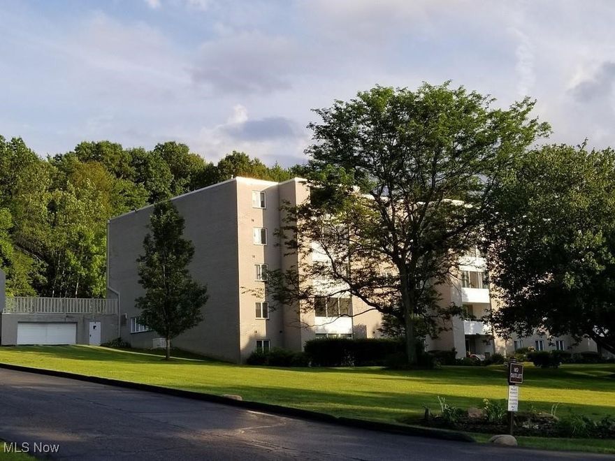You'll be city close but country quiet in this pristine, ground floor condo at Whispering Heights. Nestled in a picturesque wooded setting, it’s the most desirable place to enjoy maintenance free living in Cuyahoga Falls. Nearly everything you need is provided in the monthly condo fee, including unlimited water, gas, electric, basic cable, trash removal, landscaping and snow removal. The living room is spacious, opens to the dining room, and you’ll love the bright, pretty kitchen with a newer appliances, including an over-the-range microwave and dishwasher. The condition of the condo is important to these owners, so they made sure anything they improved was done right. This includes a newer, high-efficiency HVAC system and bathroom update, with a fantastic, walk-in alcove shower and all the fixtures. There's a laundry room right inside the unit, and if have extra loads you can always pop into the building's laundry room to double your efforts! The condo has a 4-season sunroom that can serve as a sitting room, computer room, workout room, or you can easily place a bed for little overnight guests. Building amenities include a beautiful common area with brick fireplace, call-to-talk intercom for entry, a lovely lobby for greeting guests, secure mail room, elevator, hobby room with library and pool table, exercise room, laundry facility, in-ground outdoor pool and a party/meeting room. The convenient way out to your own personal, fenced patio is through a new, energy efficient ThermalWeld Plus triple patio door, made by Polaris. The ease of operation of this door is incredible, and the manufacturer states it will be maintenance free for a lifetime. The location of the condo can’t be beat. It’s a short drive to Portage Crossing, all of the new eateries and action in the new downtown area, and the Cuyahoga Falls Natatorium and Route 8 are just minutes away. You won’t want to let this one pass you by!
