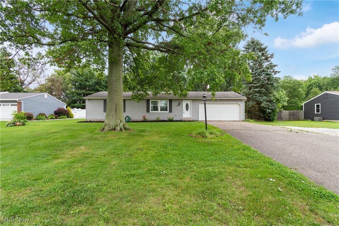 3 bedroom ranch in Jackson Twp. features an updated kitchen with stainless steel appliances, spacious living room with wood laminate flooring, new carpet in bedrooms, updated main bath, finished lower level rec. room with wood burning fireplace, lower level office, stamped concrete back patio with electrical hook up for a hot tub, fenced in yard, view of horse farm from front yard. Water softener 2021, Hot Water Tank 2018, Furnace approximately 2015, Radon mitigation system 2017. Schedule a showing today!