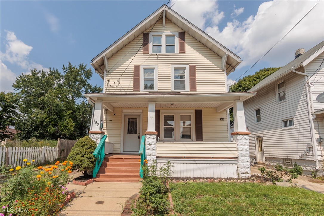 Welcome to this charming 4-bedroom Colonial home, offering a blend of classic elegance and modern comfort. The exterior features a welcoming front porch and a distinctive red brick driveway, enhancing the home's curb appeal. Inside, you'll find original Craftsman woodwork in both the living and dining rooms, adding a touch of historic charm and sophistication. The living room has been freshly painted, providing a bright and inviting space for relaxation. The kitchen is a functional delight with an abundance of countertops and cabinet storage, making it ideal for both everyday meals and entertaining. The furnace, which is just 3 years old, ensures efficient heating throughout the home. The property also boasts newer carpeting and a fenced-in backyard, offering a private outdoor retreat perfect for family activities and gatherings. This home beautifully balances classic features with modern updates, making it a wonderful place to call home.