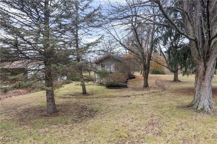 3.32 acres in Tallmadge!! Great location! Tear down and build your dream home or renovate the existing house. This property could potentially be purchased along with 353 Southeast Ave and 3 Southeast Ave. A total of 8.03 acres. Call for details or schedule your private tour today!