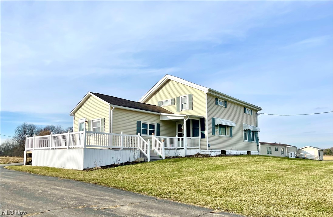 Here is a unique opportunity to own a well loved spacious country home on 4+ acres in Norwayne School District which also includes a mobile home, both with free gas (for the life of the well). Both the 2000sf home and 1200sf mobile home constructed in 2000 (converted to real estate per Auditor) share a well and septic. The farmhouse has had updates over the years including replacement windows; some flooring; Culligan water softener 2023; newer furnace; newer refrigerator; composite decking with vinyl railing and ramp. This home has an ADA accessible ramp and wheelchair accessible doorway into the 22x14 family room/was most recently used as a main floor bedroom. This room addition has its own gas forced air heating unit, separate from the rest of the home (see photos) Above ground pool with newer liner and pump is surrounded by a 16x16 deck. The 24x14 detached workshop/ garage provides ample storage for toys, mowers and vehicles. Approximately 1 acre is currently farmed by a neighbor. The attached garage/laundry room is heated. Also included is a 10x12 storage shed.