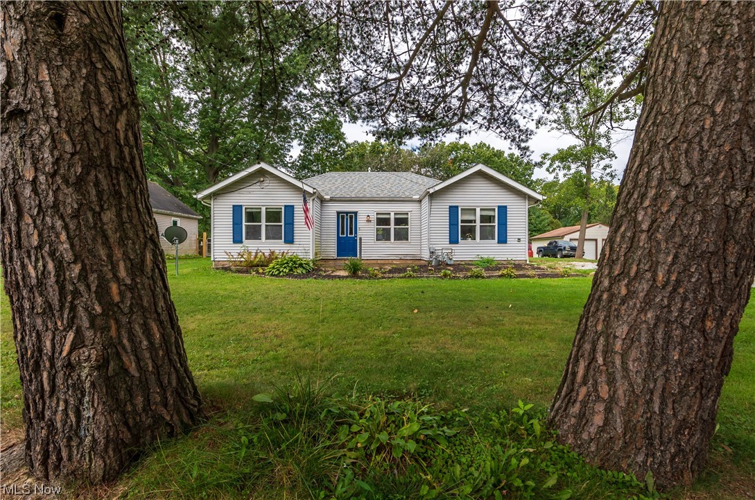 Welcome to this charming, one floor living ranch style home located in the heart of Stow! This three bedroom home is situated on almost a half acre lot. Featuring all new flooring throughout this home. This home is updated with both a fully remodeled kitchen and bathroom! The oversized detached garage gives plenty of extra space for all of your storage needs! Call to schedule your private showing today!