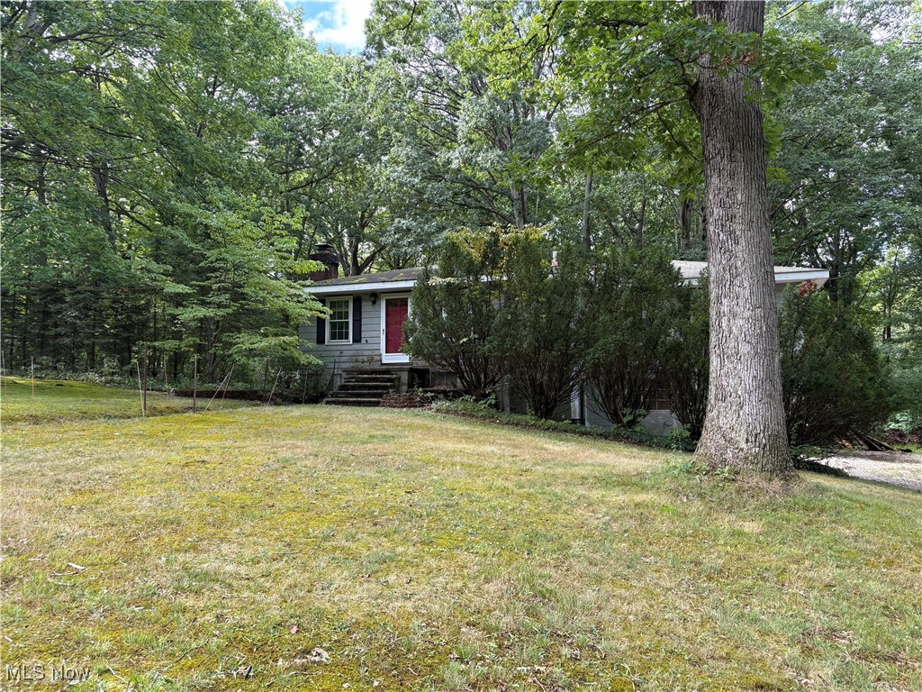 This beautiful property boasts over 7 acres of wooded property backing up to Jordan Creek. Very scenic and lots of potential here at this private setting. The main home at 12108 Concord Hambden Rd will need some renovations but is a 3 bedrooms and 1 bath ranch with the potential for a second bath which has plumbing in the lower level. The small second home on the property will most probably need torn down, or a complete renovation. Lots of room to grow this property into your own, potentially even as a horse property. This sale includes 2 parcels (12108 and 12110 Concord Hambden Rd) of land totaling slightly over 7 acres. Do not miss your opportunity to see this beautiful wooded, parklike setting! A newer well has been dug in front of the larger home but just needs a tie in, otherwise the home can run off the large holding tank already in place. Furnace is only approx. 5 years old and some newer windows are in the home. Newer well but needs tie in completed. Taxes listed and lot size are for both parcels combined. House features are for main structure.