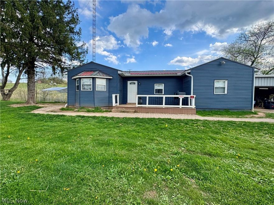 Sitting on 2.15 acres, this 4-bedroom 2-bath home offers the perfect blend of comfortable living and peaceful countryside charm.  Surrounded by open green space and mature trees, the property provides a private, serene setting ideal for those looking to escape the hustle while still enjoying everyday conviences.

The home features a spacious single-level layout.  A welcoming front entry leads to a cozy interior, while large windows bring in natural light and views from surrounding landscape.  The exterior showcases a 2-car unattached garage, a charming front porch, and a back deck with beautiful views of the pond.

Whether you're looking for a quiet homestead, a hobby farm, or simply more space to enjoy the outdoors, this property delivers a rare opportunity to own acreage with water, views, and versatility.

The Seller does not own mineral rights.  The water well on the property currently does not work and current owners haul water to fill the holding tank in the garage.  Washer and dryer go with the Seller and do not convey.