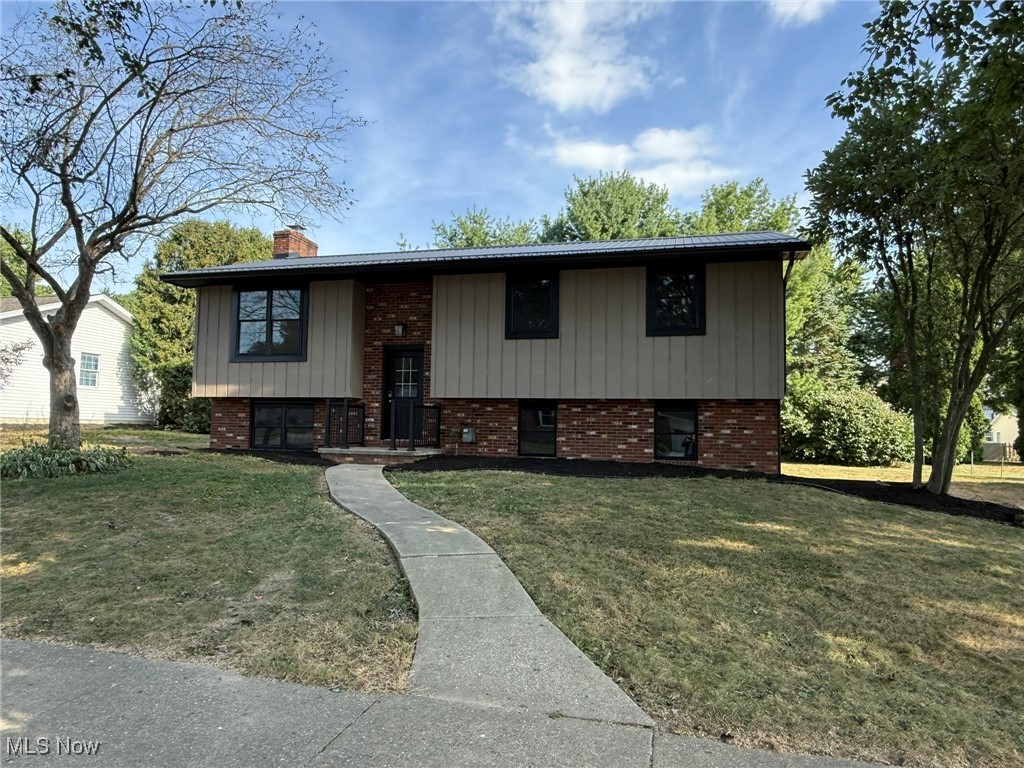 Beautifully remodeled bilevel home with 3 bedrooms, 1.5 baths. Open floorplan with fresh paint, new lighting fixtures and wood laminate flooring throughout. New Faircrest soft close cabinets in the kitchen with Quartz counters. Large 17 X 12 deck located off the dining area with new decking and vinyl banister. 3 main floor bedrooms with new carpet and ceiling fans. Remodeled main floor bathroom with double sinks and solid surface counters. Rec room in lower level features a brick fireplace with new electric insert. New gas furnace and central air. New vinyl replacement windows throughout. New metal roof with all new 6" gutters. Fresh mulch and river rock with large level backyard. Excellent southside location. This home is a must see! Taxes reflect previous owner's tax exemption. Estimated taxes are $4587.52.