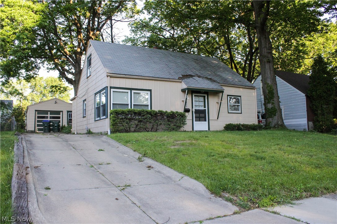 Charming cape cod in Cuyahoga Falls! This home features neutral modern paint colors throughout, and a newer hot water tank (2017). Living room offers large windows that bring in plenty of natural light. Large eat-in kitchen with ample cabinet space that walks out onto the cement patio and fenced in backyard. First floor laundry and utility closet make the layout very convenient! Down the hall on the first floor, you will find 2 good sized bedrooms and the full bath. Spacious third bedroom located on the 2nd floor with sufficient storage space. Oversized 1 car garage with some storage space. This one won't last!