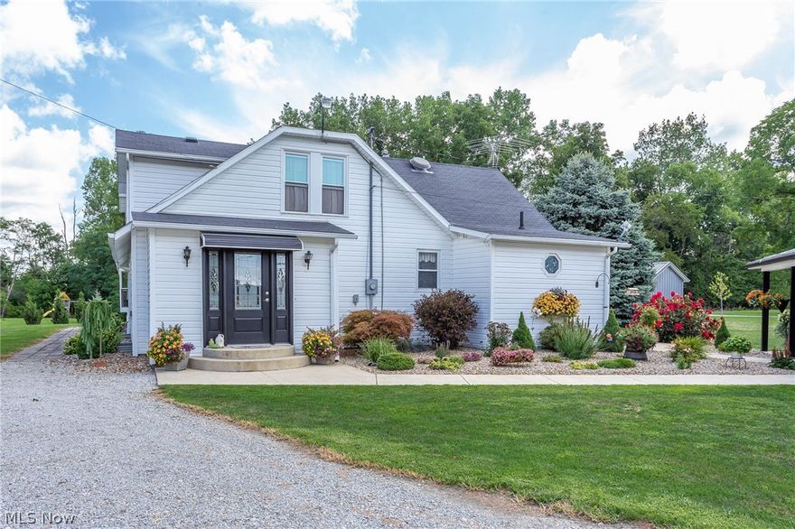 This fully updated farmhouse is just what you have been waiting for!  The details are amazing in this excellently laid out Hickory Kitchen!  From pull out pantry and soft close drawers, to the stainless steel farm sink, Corian counter-tops, all of this opens up to the dining room and allows this layout to flow beautifully.  Also on the first floor is the master bedroom suite, first floor laundry, and large rec room perfect for family and entertaining.  The over-sized 23' x 35' detached garage is a dream, two carriage style garage doors 10' and 8', propane heated, 250lb electric hoist/lift, and half bath all in just the garage!  Enjoy outdoor living space on the patio that spans the full length of the home and extending to the garage.  The patio off of the home boasts a powered retractable awning while the garage has a wonderful side porch.  This home is perfect for family and entertaining!  Plenty of parking and space to spread out with this glorious property.  Kitchen appliances are i