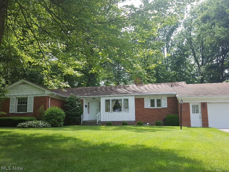Fantastic Brick Ranch in Canfield. Well maintained 3 bedroom, 3 full bath and 1/2 bath, 2 fireplaces, crown moldings and beautiful hardwood floors. Updated kitchen features solid wood cabinetry, ceramic floors and spacious eat in area (23 X 11). Attached 2 car garage, 11 X 22 back patio over looks a wooded backyard. Note - Partially finished basement has been waterproofed and Matthews Wall Anchor System with transferable warranty.