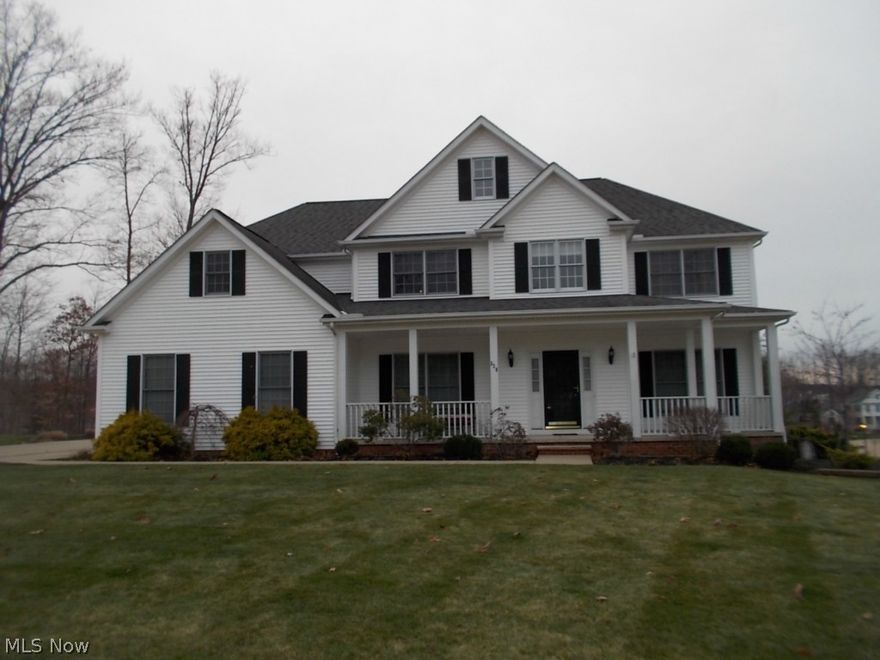 Beautiful 4 Bdrm  home with an awesome front porch in a great lake community. Huge finished basement with loads of storage & a full bath. Like new hardwood floors in the kitchen, breakfast area & dining rm. Very Modern Kitchen with Granite countertops, Glass Tile and Stainless Steel appliances. A lovely private paver patio with brick terracing down to the large yard off the kitchen. You will love the 1st floor Laundry room and the Whole house vacuum system. The home has a stunning two-story foyer & greatroom w/a gas fp. A split staircase from the foyer to the kitchen. The master suite includes a Tray ceiling, sitting room & glamour bath w/jetted tub & double sinks with Granite Countertops. Three very spacious bedrooms complete the 2nd floor. A great floor plan for entertaining. Plus a Huge 3 car attached garage. All this and the amenities of Hawthorn - a 300 acre lake, pool tennis courts and club house. Come see this great family home and all it has to offer!! Seller Offering a Home Wa