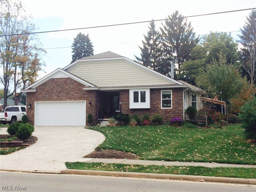 Exceptional newer home featuring open floor plan over looking Price Park. Builder's own personal residence features many enhanced options. Wonderful outdoor living space with retractable awning over patio and gas hook up for grill. Energy efficient design with insulated siding, high efficiency furnace will keep you warm this winter. Two car attached garage and two car detached garage.