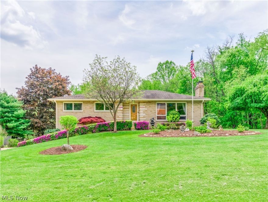 Attractive all Brick 3 bedroom Ranch on 1.67 acres. Living room with large picture window and gas fireplace. The kitchen has Granite countertops, Stainless Steel appliances 2019, double oven, breakfast bar, microwave, and convection oven plus pantry and dinette. First-floor bedrooms all have hardwood floors. Updated bath 2018, Unique 1st-floor laundry in the master bedroom closet.  The lower level includes carpeted family room with a gas fireplace, a 4th bedroom, 2nd bath w/shower. Patio overlooks the private backyard with mature trees & nice landscaping. Beautiful picturesque spring-fed pond with fountain and stone waterfall. 2.5 car attached garage and 2 outbuildings, a metal shed 26x20, and a red barn 24x20 with a screened-in firepit, space to park an RV or camper. Furnace 2002, hot water tank 2002, and roof 2005 (40 yr.). Carport 14x30. Well and septic. Generator 2010, humidifier, and water softener included. *** All items are for sale in the home and both outbuildings***