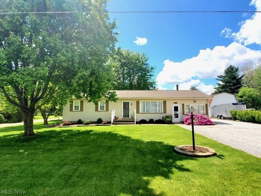 Check out this 2 bedroom Tuslaw Ranch! This place has been meticulously cared for and is ready for new owners to add their personal touches. The back deck overlooks the beautiful 1/2 acre yard and the garage offers TONS of space, water available, and electric. This would make a perfect shop and/or hang out spot. This place has something for everyone, and at this price, it won't last!