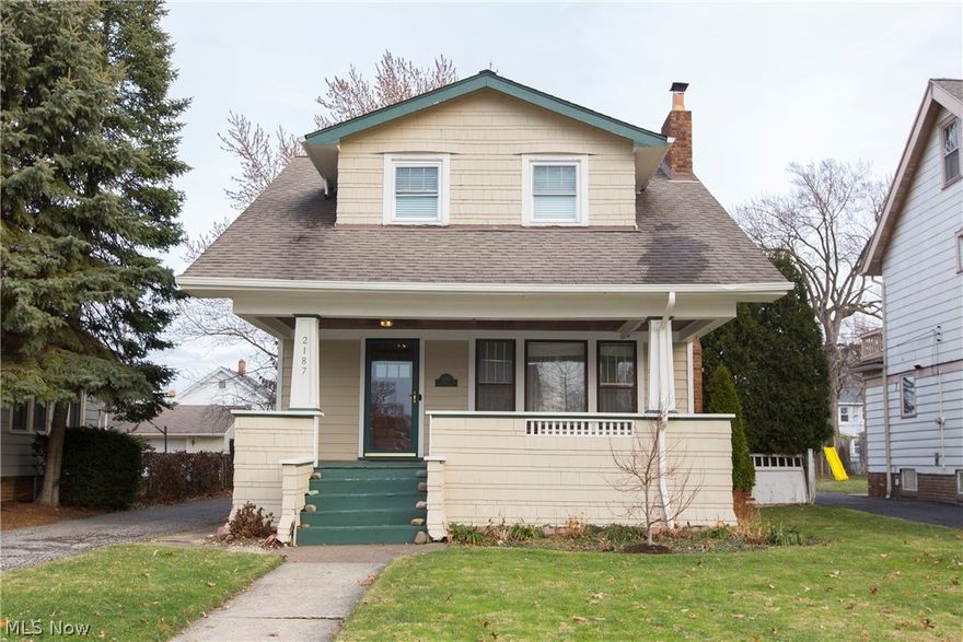 Enjoy your large front porch on one of Lakewood's finest streets.  Large backyard with two car garage and Deck.  Charm and character found throughout the home.  Eat-In Kitchen, formal dining room with french doors to deck, and backyard.  Build-in corner cabinets, hardwood floors throughout.  Large living room with brick fireplace and wooden mantel and built-ins.  Natural woodwork on first floor.  Beautiful front door.  3 bedrooms up with one larger master bedroom.  Additional Bonus room on back of house might have been small back porch at some time.  Overlook this wonderful backyard.  Sit on deck or relax on front porch, this house will feel like your home after you make it your own.  Large finished basement, and many more great features.  Needs TLC and is being sold as is.  Amazing potential to do what you would like to because this home is under priced for the neighborhood.