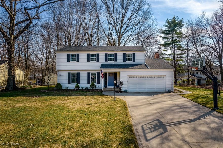 This is the one!!!  PRIDE is the word that the current owners use when it comes to this beauty! From the moment you drive up, then walk in, you'll see that this home has been loved.  Tucked away on a tree-lined street in the Hiles and Dales community, this 4 bedroom, 2 1/2 bath colonial has lots of extras.  The kitchen boasts maple cabinetry, granite counters, a breakfast bar, and all of the appliances remain. All of the interior painting was done in 2023 and 2024. The living room and family room feature hardwood flooring!  The family room also has a fireplace and built-in shelves and drawers!  The primary bedroom is huge, and wait until you see the walk in closet!  All of the bedroom have hardwood flooring!  The primary bathroom was remodeled in 2024, and features an over sized glass shower.  For extra space, there is a recroom in the basement. The furnace and A/C were new in 2019, The windows were replaced in 2010. The massive backyard offers a large deck with a gazebo, and a concrete patio.  Plus, there is a shed for storage!  Home warranty for added peace of mind