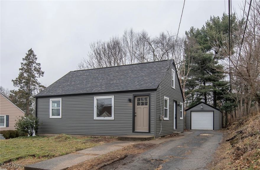 Move-in ready and extensively updated! This home features a brand-new lifetime architectural shingle roof, vinyl siding, gutters with micro-mesh leaf guards, several new vinyl windows, and a new 50-gallon gas water heater. The custom kitchen offers all-new cabinetry, quartz countertops, an under-mount stainless 60/40 sink, new faucet, and a full stainless appliance package. Interior updates include fresh paint throughout, new LED lighting, new trim and doors, updated electrical, mostly new plumbing, and all-new flooring and carpet. The completely rebuilt second floor adds a true 3rd bedroom, with new insulation, drywall, trim, paint, and carpet. Total living space is approximately 1,135 sq ft (second floor not yet reflected on auditor’s site). Basement walls and floors freshly  painted. Schedule your showing today and see the value for yourself!