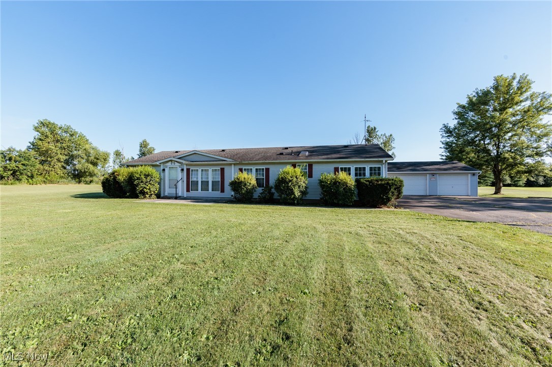 Welcome to easy one-floor living in this meticulously maintained ranch! This super clean, move-in-ready home offers 3 bedrooms and 2 full baths, all situated on a desirable 4-acre lot. Step inside and be greeted by soaring cathedral ceilings that create an open and airy atmosphere throughout. The heart of the home, the kitchen, boasts classic oak cabinets and comes fully equipped with all appliances. It seamlessly opens to a formal dining room, perfect for entertaining, as well as a charming morning room featuring walls of windows that invite abundant sunshine to start your day. Relax and unwind in the family room, complete with a cozy gas log fireplace. For ultimate convenience, a dedicated laundry room is located off the garage breezeway and includes both a washer and dryer. Car enthusiasts and hobbyists will rejoice at the expansive three-car garage, offering ample storage space. In addition, a substantial 24x12 storage shed with power provides even more room for all your needs.
With its pristine condition, thoughtful layout, and impressive 4-acre property, this home is a true must-see. Don't miss the opportunity to make it yours! Schedule your private tour today!