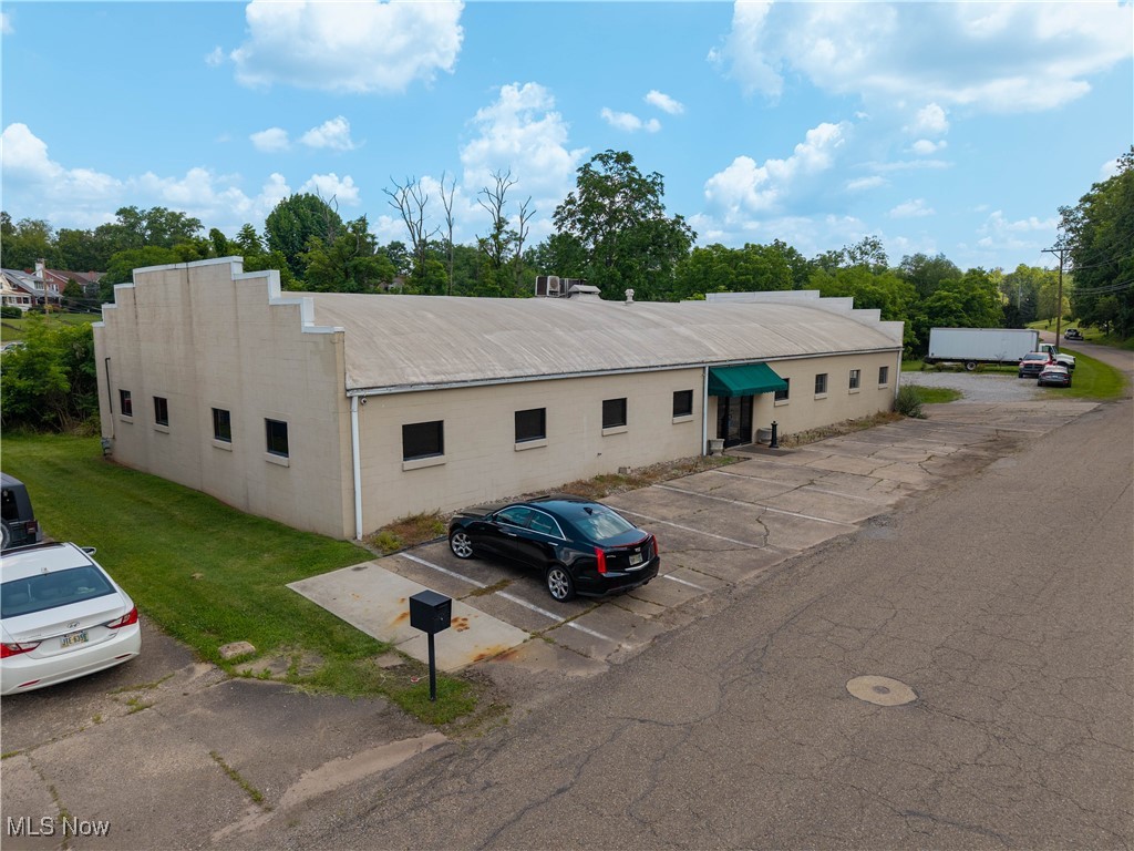 Wonderful commercial property visible from State Route 60/Muskingum Drive in Marietta. that was completely remodeled in 2019 offering 5 finished office spaces, conference room, lunch room, lobby, two ADA compliant bathrooms plus shower and newer rubber coated roof. Attic has pull down steps for storage. We have a loading dock for delivery and pickup with 22+ off street parking spaces. There are 2 HVACS one that services all the finished office areas and one for the warehouse space. Ideal use would be specialty retail outlet light manufacturing/production/assembly work, or small warehouse/distribution. Property is in R1 but is taxed as C4 and grandfathered in as it has always been a commercial property. Owner will consider owner financing or installment sale.
