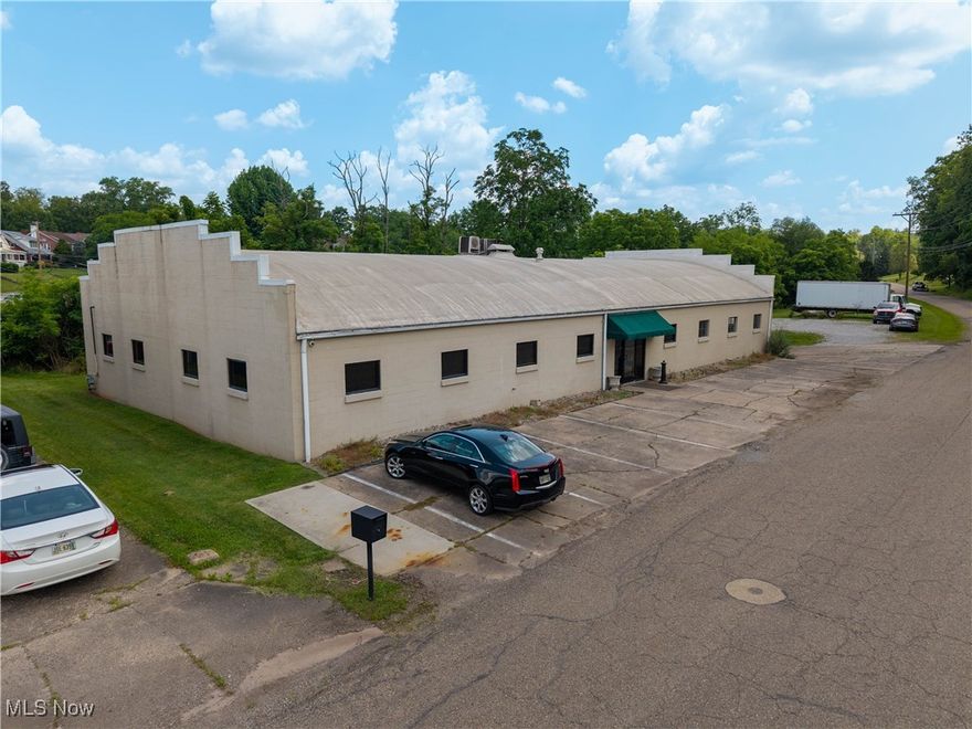 Wonderful commercial property visible from State Route 60/Muskingum Drive in Marietta. that was completely remodeled in 2019 offering 5 finished office spaces, conference room, lunch room, lobby, two ADA compliant bathrooms plus shower and newer rubber coated roof. Attic has pull down steps for storage.  We have a loading dock for delivery and pickup with 22+ off street parking spaces. There are 2 HVACS one that services all the finished office areas and one for the warehouse space.  Ideal use would be specialty retail outlet light manufacturing/production/assembly work, or small warehouse/distribution.  Property is in R1 but is taxed as C4 and grandfathered in as it has always been a commercial property.  Owner will consider owner financing or installment sale.